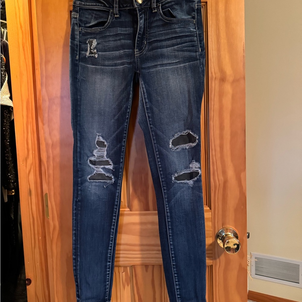 Women's Distressed Blue Jeans